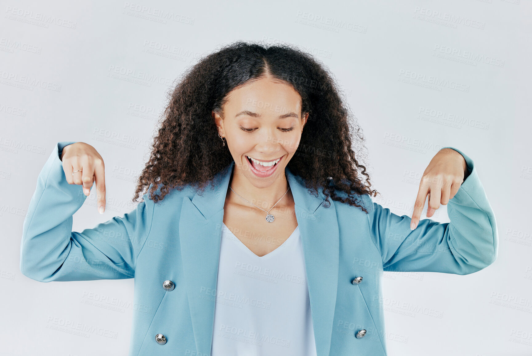 Buy stock photo Advertising, excited and woman pointing down at product placement, deal or sale isolated in studio white background. Happy, smile and cheerful businesswoman smiling for promotion announcement