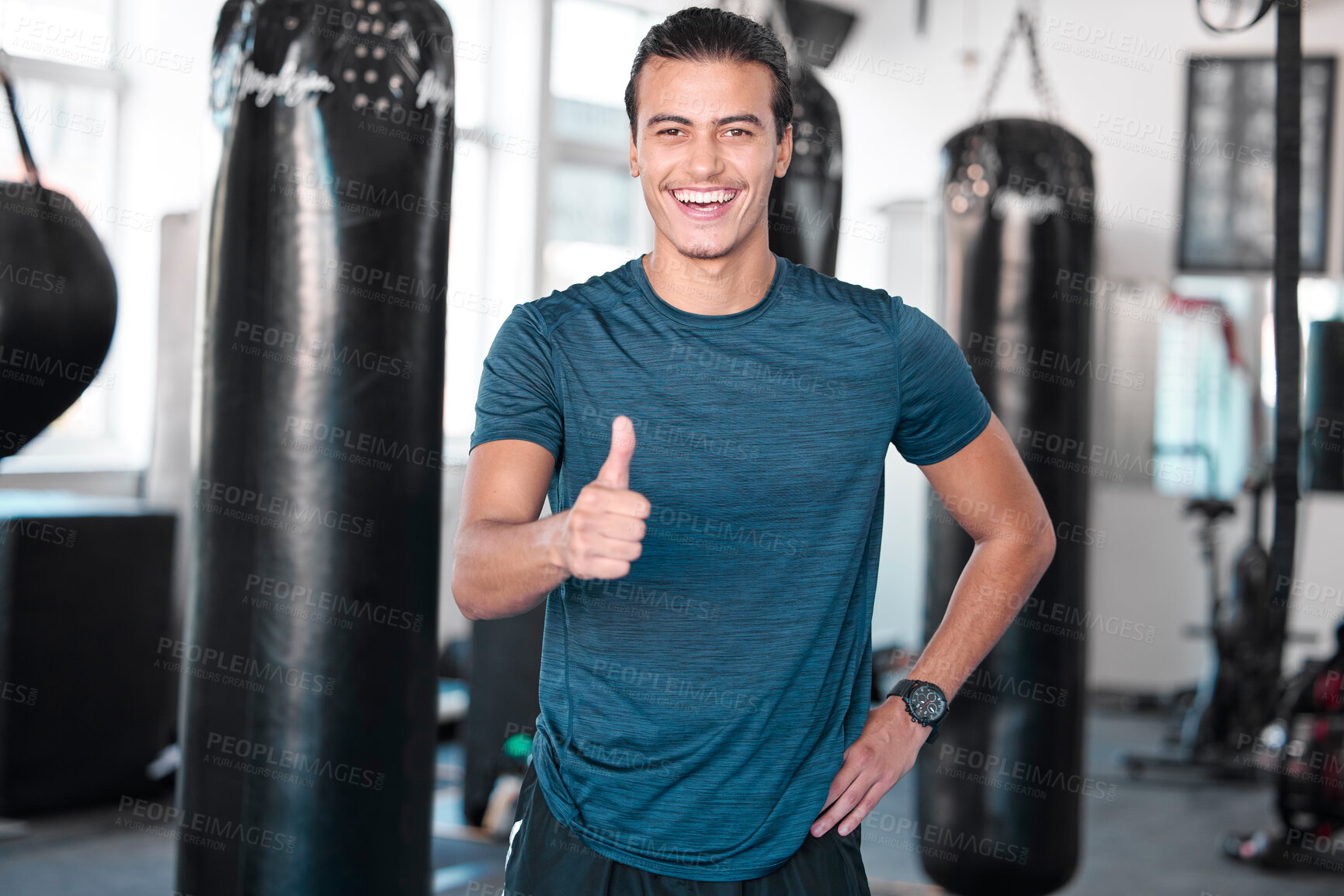 Buy stock photo Laughing, thumbs up and portrait of man in gym for success, motivation or workout. Comic, hand gesture or happy male athlete with emoji for yes, like or approval, agreement or fitness, goal or target