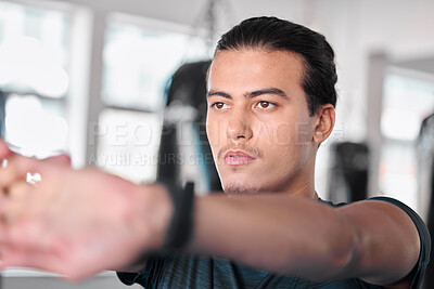 Buy stock photo Hands, stretching fingers and man in gym ready to start workout, training or exercise. Sports fitness, thinking and serious male athlete warm up, stretch or prepare for exercising for flexibility.