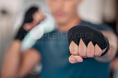 Buy stock photo Man, fist and boxing, fitness and martial arts in gym, exercise and power, strong person and punch. Workout, male boxer training in combat and sports, athlete ready to fight and mma fighter hand zoom