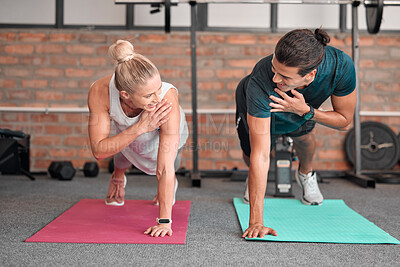 Fitness, push up and woman with partner, personal trainer or gym coach for support, teamwork and muscle goals. Athlete, sports and couple of friends in strong workout, exercise or training together