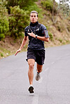 Running, fitness and portrait of man runner for outdoor training or exercise goals, challenge and sports health in nature. Young, fast and speed of serious athlete in cardio workout on road or street