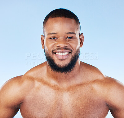Buy stock photo Body care, portrait and man in studio for cleaning, grooming or hygiene against blue background. Face, shower and male wellness model relax for beauty, routine and self care while posing isolated