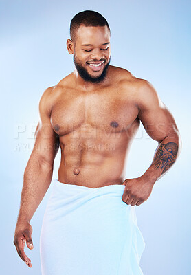 Buy stock photo Towel, shower and fitness body of a black man with happiness from bodybuilder muscle. Cleaning, skincare and wellness after sport workout and exercise with isolated, studio and blue background