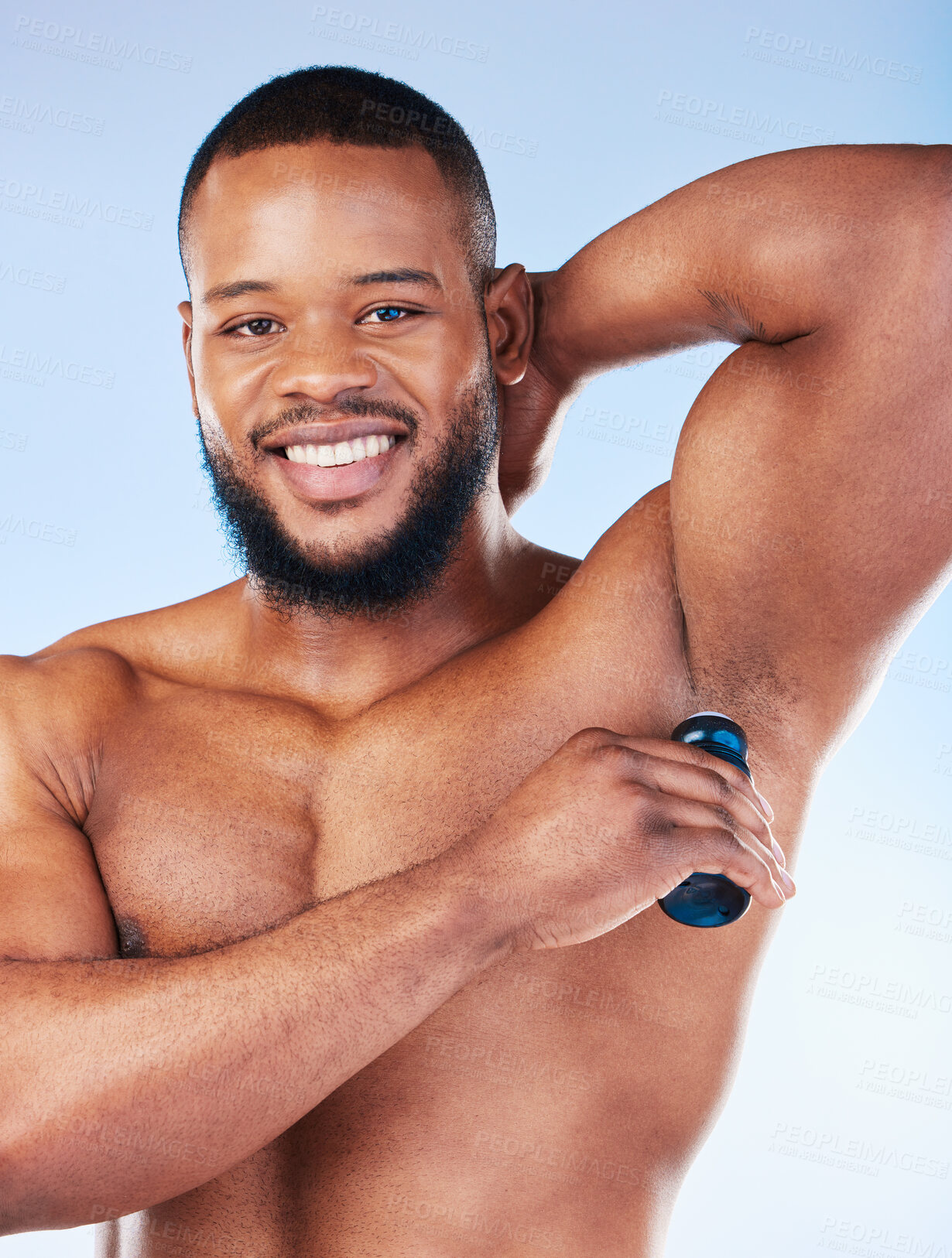 Buy stock photo Deodorant, products and portrait of black man for beauty, grooming and body hygiene on blue background. Skincare, health and male with antiperspirant, fragrance or scent product for underarm wellness