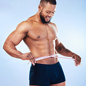 Strong man, body and fitness with underwear for exercise, weight loss and  wellness on studio backgr Stock Photo by YuriArcursPeopleimages