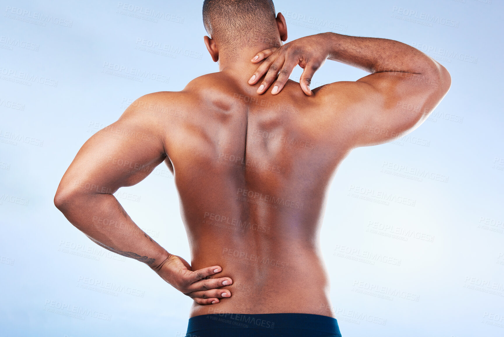 Buy stock photo Black man, neck pain and back injury with fitness and health, medical problem and aching body in studio. Emergency, muscle tension and male athlete with joint ache from workout on blue background