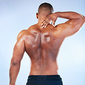 Black man, fitness and body, measuring tape and abs with health, weight loss  and active lifestyle o Stock Photo by YuriArcursPeopleimages