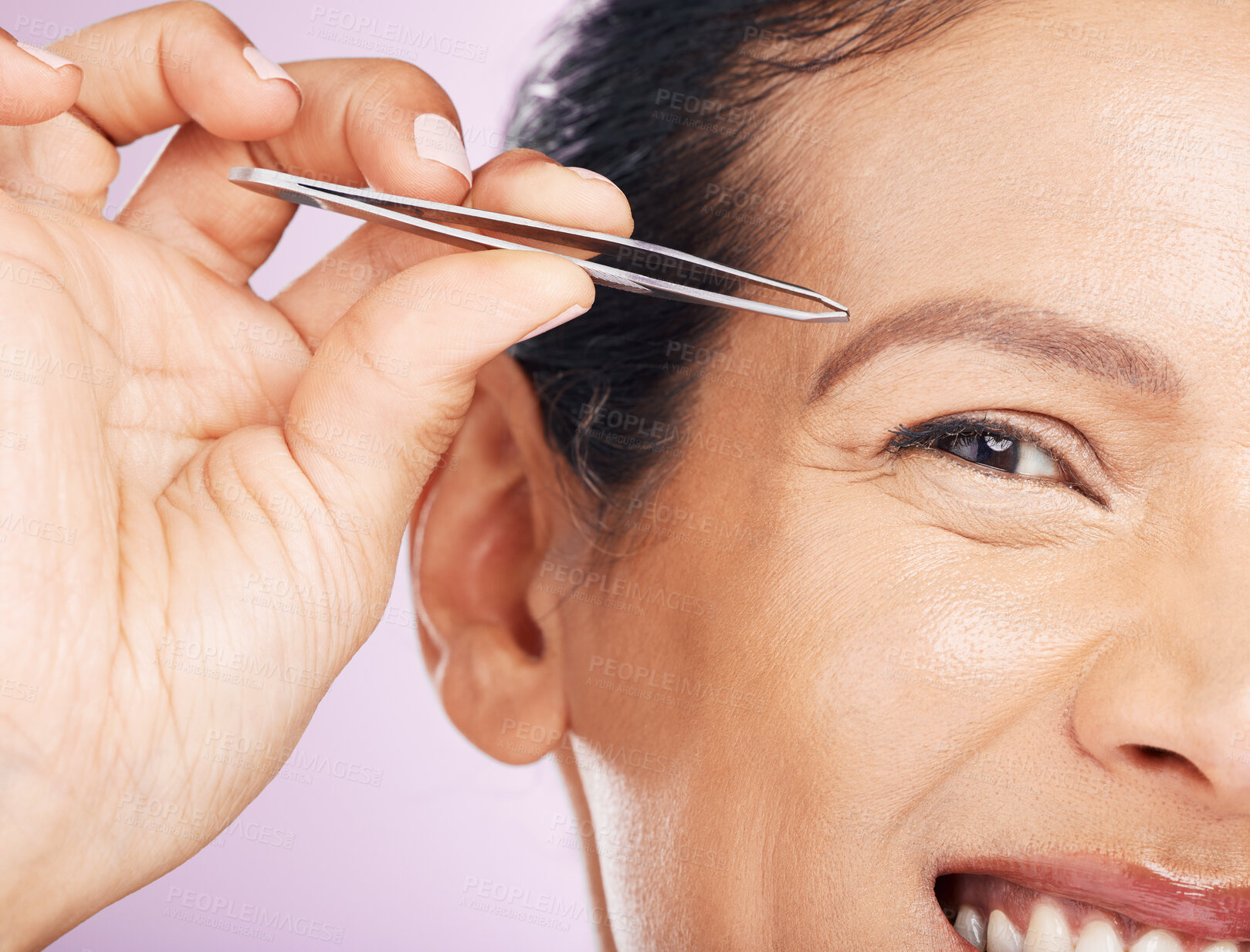 Buy stock photo Woman with tweezers for plucking eyebrows in studio for mature facial hair removal routine. Self care, grooming and closeup of female model tweezing for face epilation treatment by purple background.
