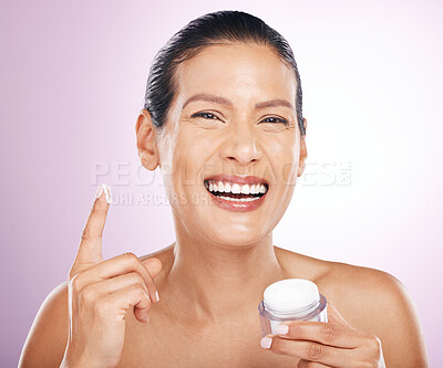 Buy stock photo Face, cream jar and skincare of woman in studio isolated on purple background. Mature portrait, cosmetics and funny female model with dermatology lotion, creme or moisturizer product for healthy skin