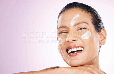 Buy stock photo Face, cream and skincare of woman laughing in studio isolated on purple background mockup. Mature, portrait and happy female with dermatology lotion, creme and moisturizer cosmetics for healthy skin