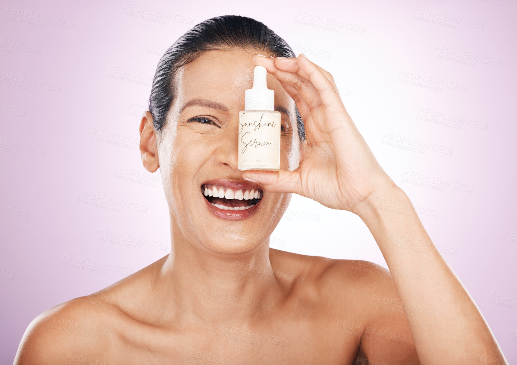 Buy stock photo Laughing, face and woman with serum bottle in studio isolated on purple background. Skincare, cosmetics portrait and happy, funny or mature female model with hyaluronic acid, retinol or essential oil