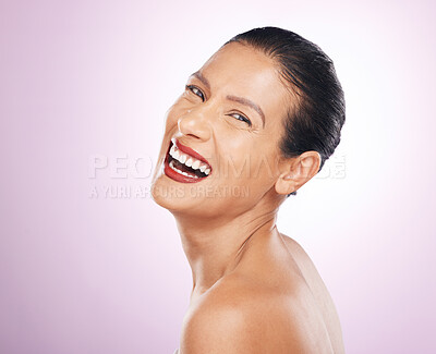Buy stock photo Laughing, face makeup and lipstick of woman in studio isolated on a purple background. Skincare, cosmetics portrait and happy, funny and mature female model with red lip gloss for skin glow or beauty