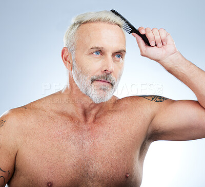 Buy stock photo Haircare, combing and grooming with man in studio for style, barber and morning routine. Beauty, hairdresser and salon with senior male on white background for handsome, self care and brushing 