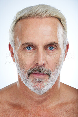 Buy stock photo Old man, portrait and serious, face with beauty and grooming, hygiene with skincare on studio background. Dermatology, headshot and skin with anti aging cosmetic care, senior male and wellness