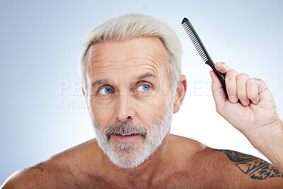 Buy stock photo Hair style, comb and grooming with man in studio for haircare, barber and morning routine. Beauty, hairdresser and salon with senior male on white background for handsome, self care and brushing 