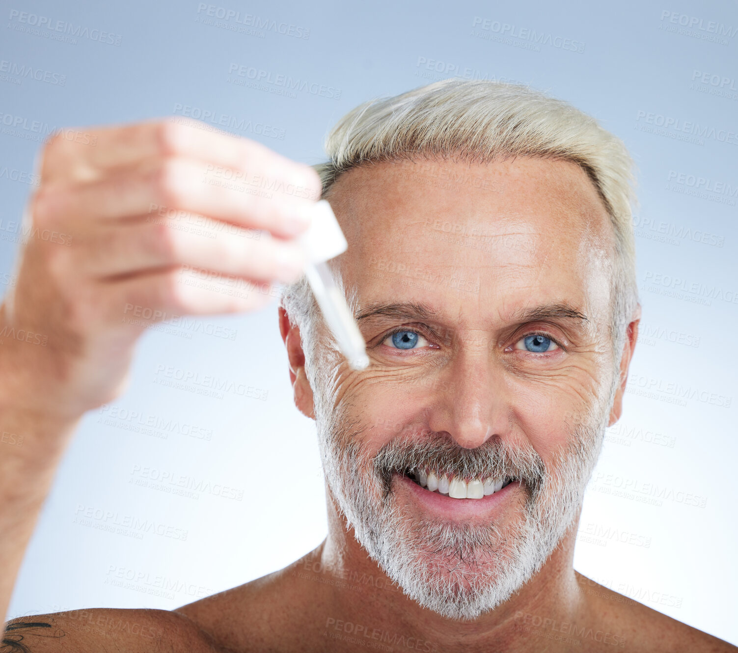 Buy stock photo Old man, portrait and smile, face with serum for skincare, beauty and grooming with facial oil on studio background. Closeup of dropper, anti aging cosmetic care with happy senior male and hygiene