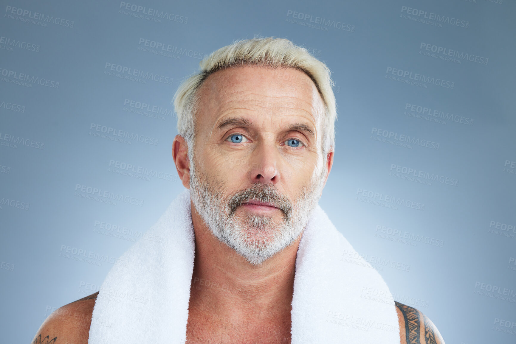 Buy stock photo Beauty, shower and portrait of man in studio for clean, self care and morning routine. Cosmetics, dermatology and washing with male and towel on grey background for grooming, hygiene or spa mockup