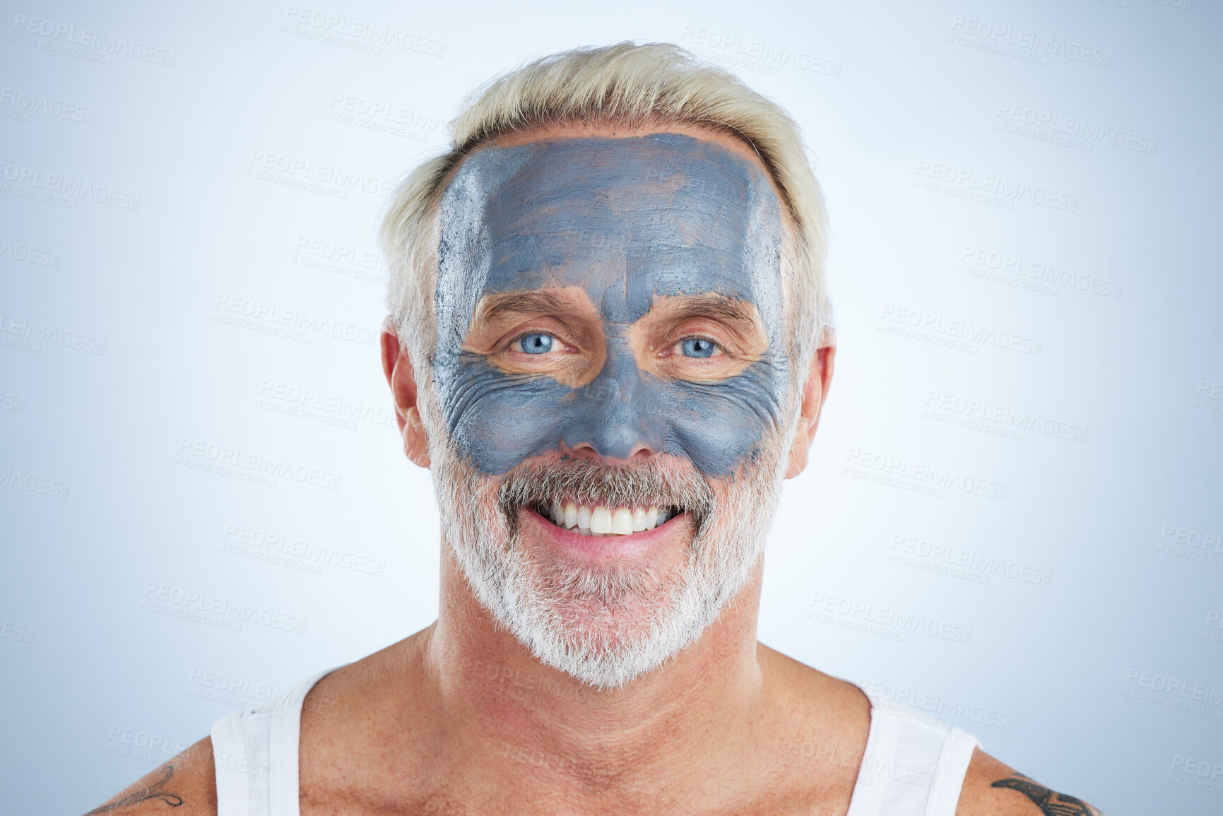 Buy stock photo Mask, skincare and facial with portrait of man in studio for cleansing, detox and spa. Cosmetics, beauty and dermatology with senior model on gray background for anti aging, product and natural