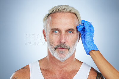 Buy stock photo Syringe, facial and portrait of a senior man in a studio doing plastic surgery and cosmetic skincare. Dermatology, wrinkles and anti aging treatment of a mature model with silicone filler injection