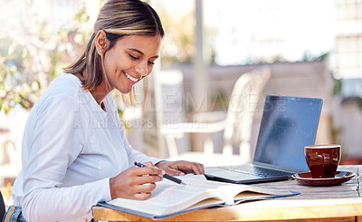 Buy stock photo Woman, reading textbook and student, education with smile and study academic course, learning and university. Happy female at outdoor cafe, book and pen for research and studying for exam with laptop