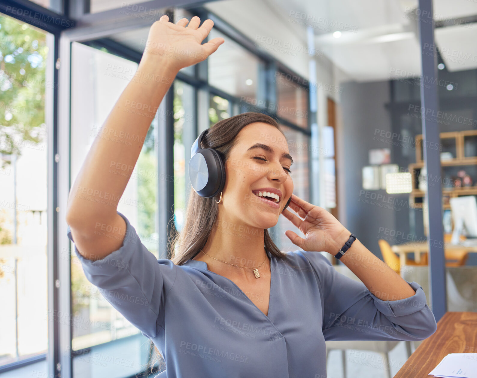 Buy stock photo Headphones, music and happy business woman dance in office, smile and excited while having fun. Podcast, radio and dancing female corporate employee relax with audio playlist, track or song at work