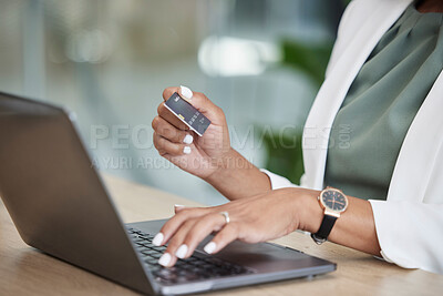 Buy stock photo Woman hands, credit card and laptop for business online shopping, banking or fintech payment at her office. Professional person typing financial code information on computer for loan or transaction