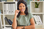 Portrait, customer service and support with a black woman consulting using a headset in an office at work. Contact us, crm and assistance with a female consultant, agent or receptionist ready to help