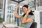 Black woman, music and headphones in office with happy energy, singing and dancing for mental health and working. Professional worker or business person listening to audio tech for workplace wellness