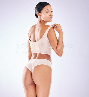 Premium Photo  Hands butt and underwear with a woman model in studio on a  gray background squeezing cellulite from the back liposuction wellness and  heath with a female touching her buttocks