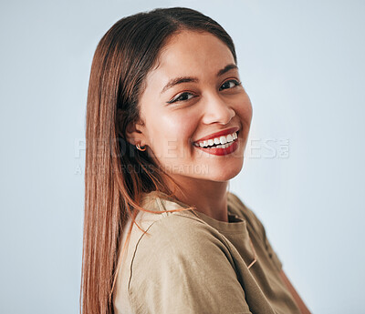 Buy stock photo Woman, smile portrait and happiness of a gen z female in a studio with gray background. Isolated, happy and freedom from a person feeling carefree, youth and confidence with laughter from motivation