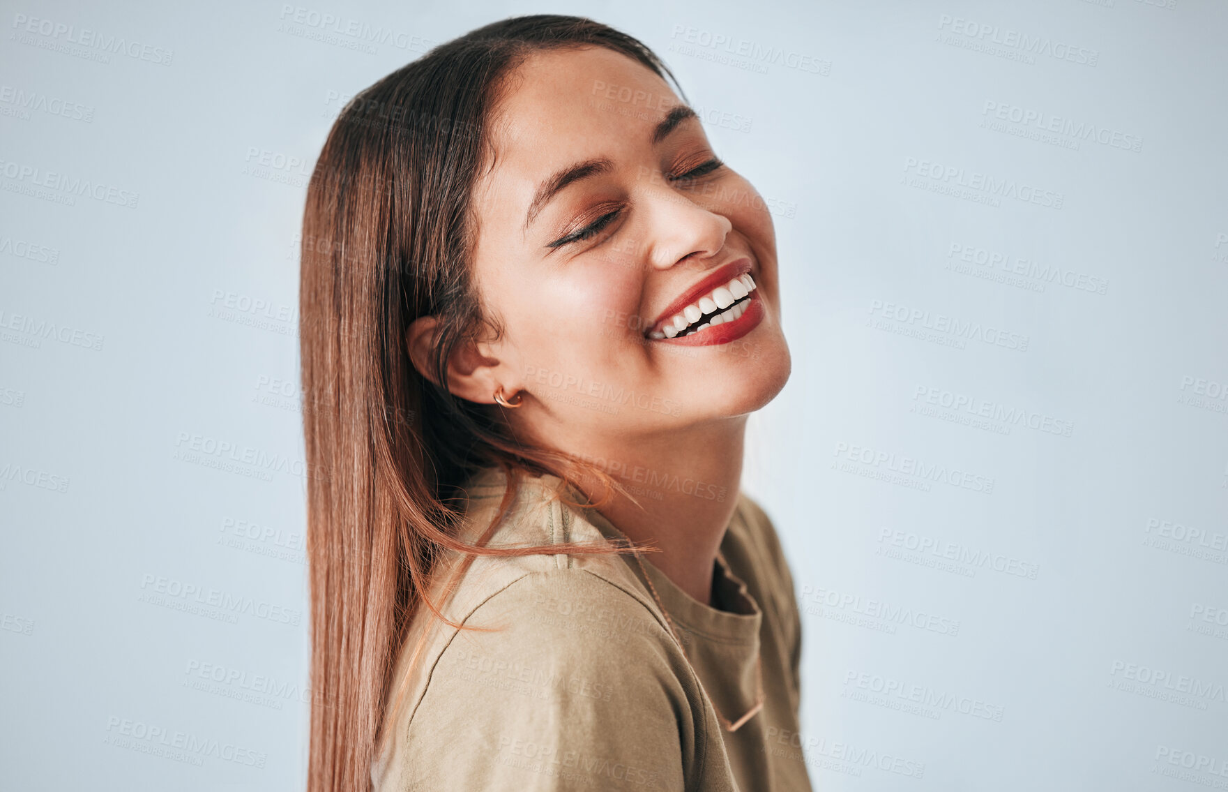 Buy stock photo Woman, laughing and happiness of a gen z female in a studio with gray background. Isolated, happy and smile from a young person feeling carefree, youth and confidence with laughter from funny joke