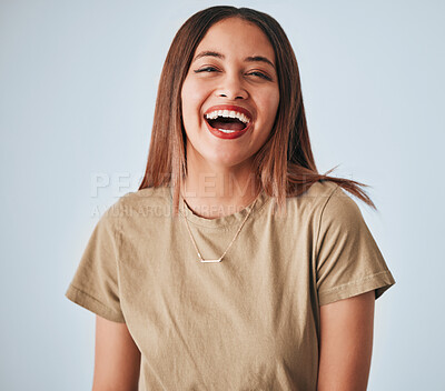 Buy stock photo Happy, laughing and portrait of a cheerful woman isolated on a white background in studio. Smile, funny and a beautiful young girl with happiness, smiling and positivity on a backdrop for expression