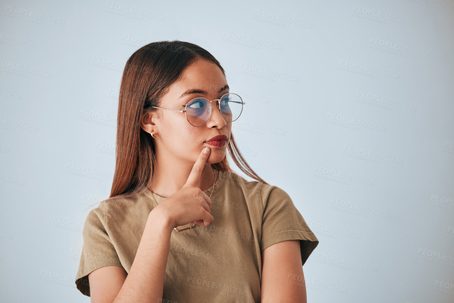 Buy stock photo Woman, thinking and space for idea with glasses in studio for advertising or product placement mockup. Female with hand on chin for doubt or planning logo or branding decision on a white background