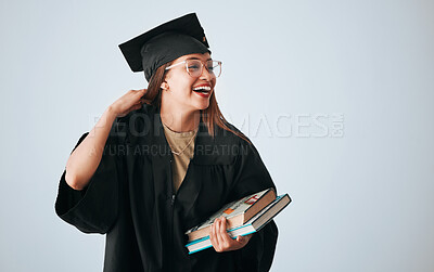 Buy stock photo Graduation cap, books and happy woman isolated on studio background education, college or scholarship success mockup. Biracial university student or graduate with reading knowledge and learning goals