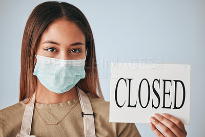 Buy stock photo Woman, closed sign and mask for covid in studio portrait for safety, wellness or board by background. Entrepreneurship, small business owner and paper poster for warning in management job by backdrop