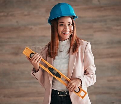 Buy stock photo Architect, woman and portrait smile with level tool for measuring balance in construction planning. Happy female contractor, engineer or builder smiling with safety helmet equipment for architecture