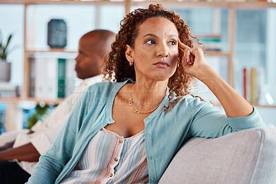 Buy stock photo Frustrated couple, crisis and woman on sofa for marriage problem, drama and bad communication in lounge. Divorce, argument and fighting with angry partner, conflict affair and betrayal of cheating 