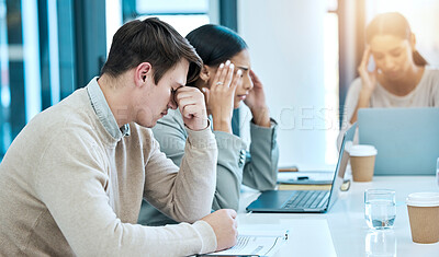 Buy stock photo Tired, stress and business people in a meeting with a headache, problem and team depression. Sad, anxiety and corporate employees frustrated with burnout, fatigue and a coworking mistake at work