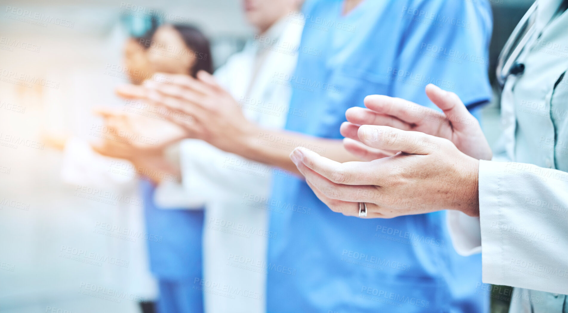 Buy stock photo Clapping hands, celebration and team of doctors in the hospital with success in teamwork or collaboration. Solidarity, professional and group of healthcare workers with applause in a medical clinic.