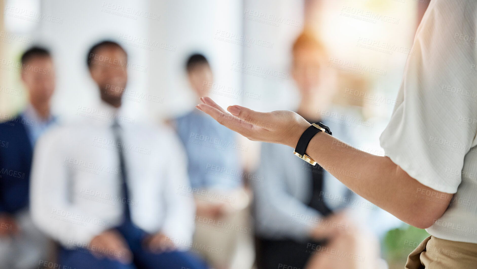 Buy stock photo Leadership, presentation and hands of a manager in a conference for a meeting or training workshop. Coaching, staff and a speaker with a speech, talking and standing with employees for a seminar