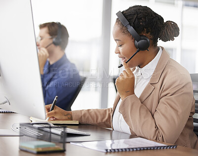 Buy stock photo Black woman, call center and writing notes, smile in office and working on customer service in workplace. Telemarketing, notebook and happy person, female sales agent or consultant talking online.