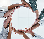 Teamwork, collaboration and hands of business people in circle for motivation, support and connect in office. Diversity, team building and below view of men and women palms for goal, trust or mission