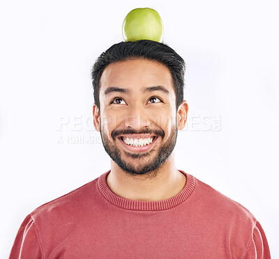 Buy stock photo Smile, apple and man in studio for diet, nutrition and balance with healthy breakfast on white background. Fruit, weight loss and asian guy nutritionist with organic, clean and fiber detox isolated