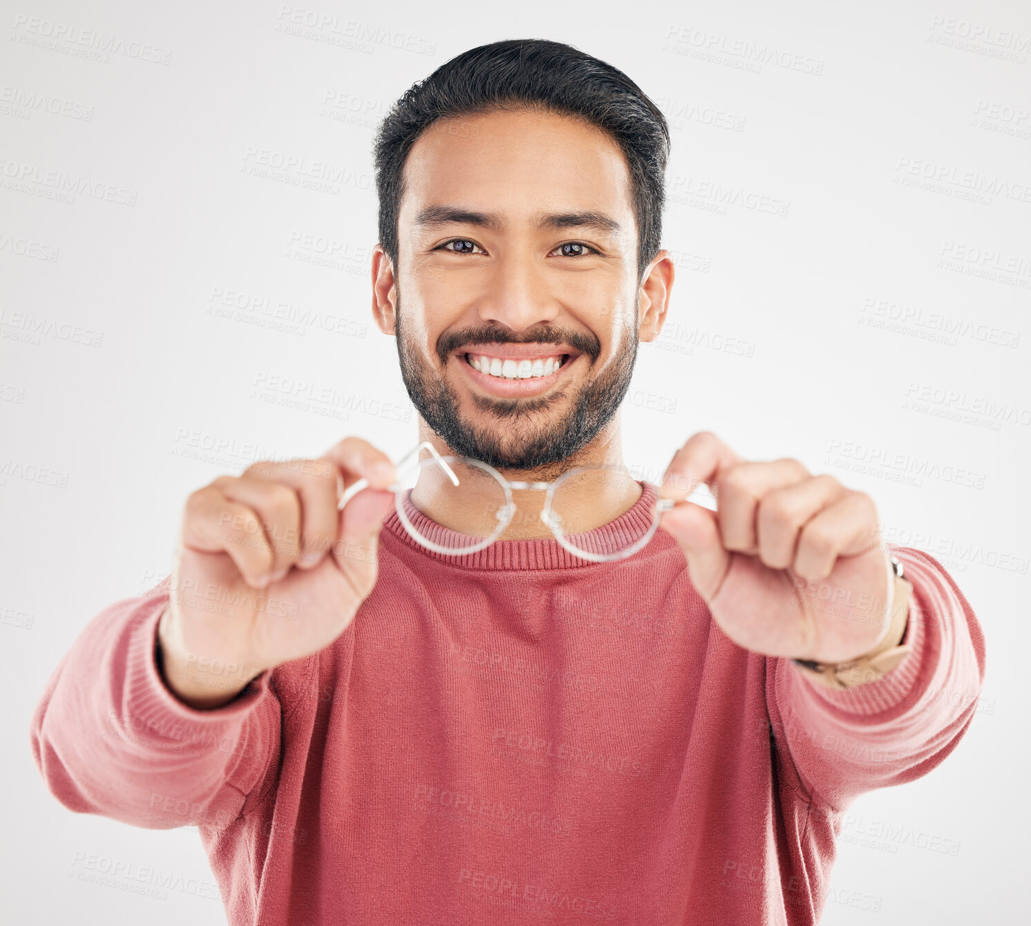 Buy stock photo Glasses, man smile and portrait in a studio happy from vision and showing eyewear choice. Isolated, white background and happiness of an Asian male model with lens prescription and frame decision