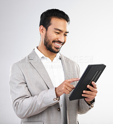 Buy stock photo Smile, business and Asian man with tablet, typing and connection isolated on a white studio background. Japanese male ceo, employee and entrepreneur with device, scroll and network for online reading