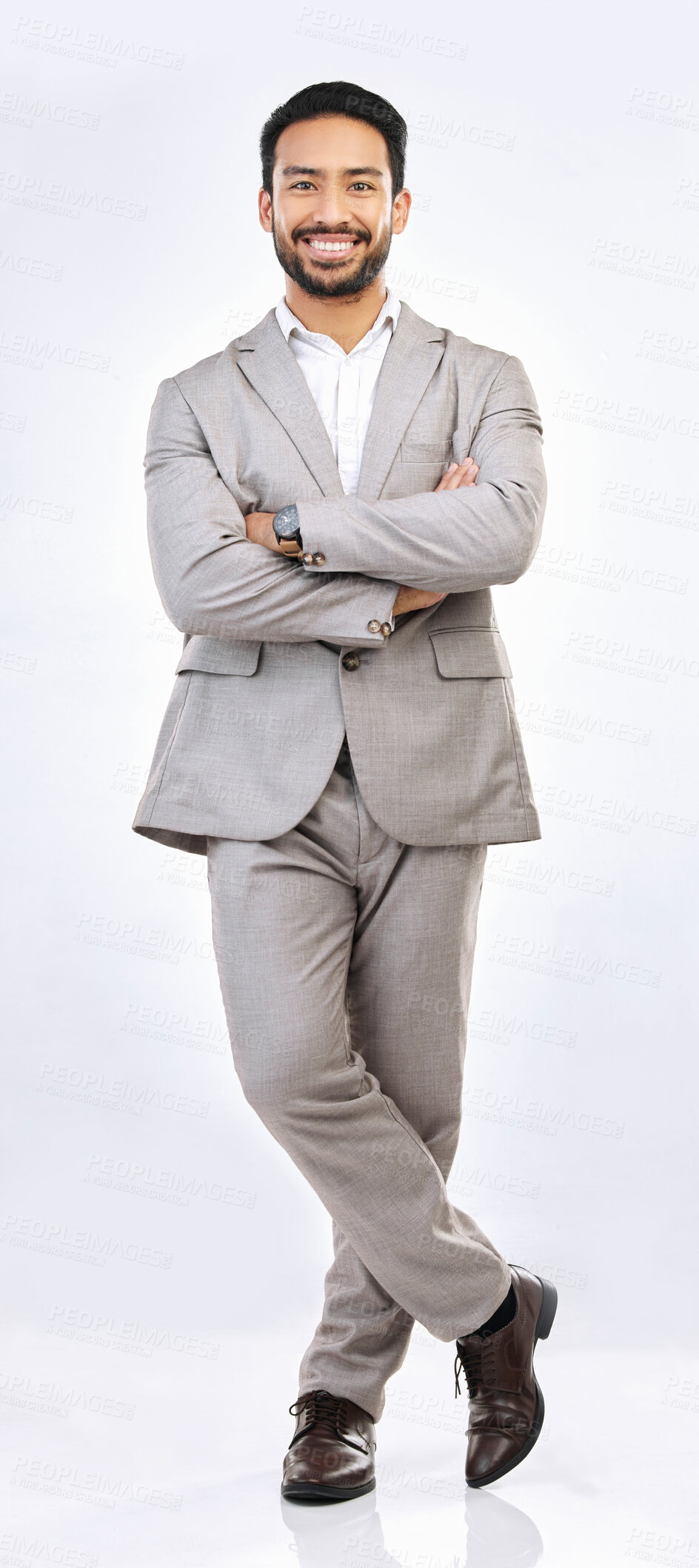 Buy stock photo Portrait, professional and a business man on a gray background, standing arms crossed in studio. Corporate, smile and trust with a happy male employee looking confident in the success of his company