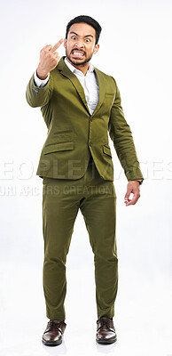 Buy stock photo Angry, crazy and portrait of an Asian man with a middle finger isolated on a white background in a studio. Negative, anger and a frustrated Japanese businessman showing an offensive hand gesture