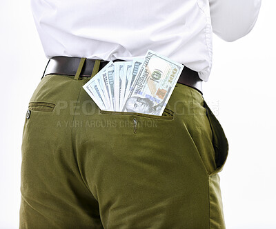 Buy stock photo Closeup, dollar and man in studio for money laundering, scam and bribe while posing against white background. Pocket, cash and businessman stealing, fraud and corruption, crime and secret payment 