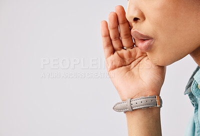 Buy stock photo Woman, secret and hand over mouth on mockup in studio against a gray background to whisper gossip or a rumor. Communication, news and a female closeup talking with secrecy to keep her voice silent